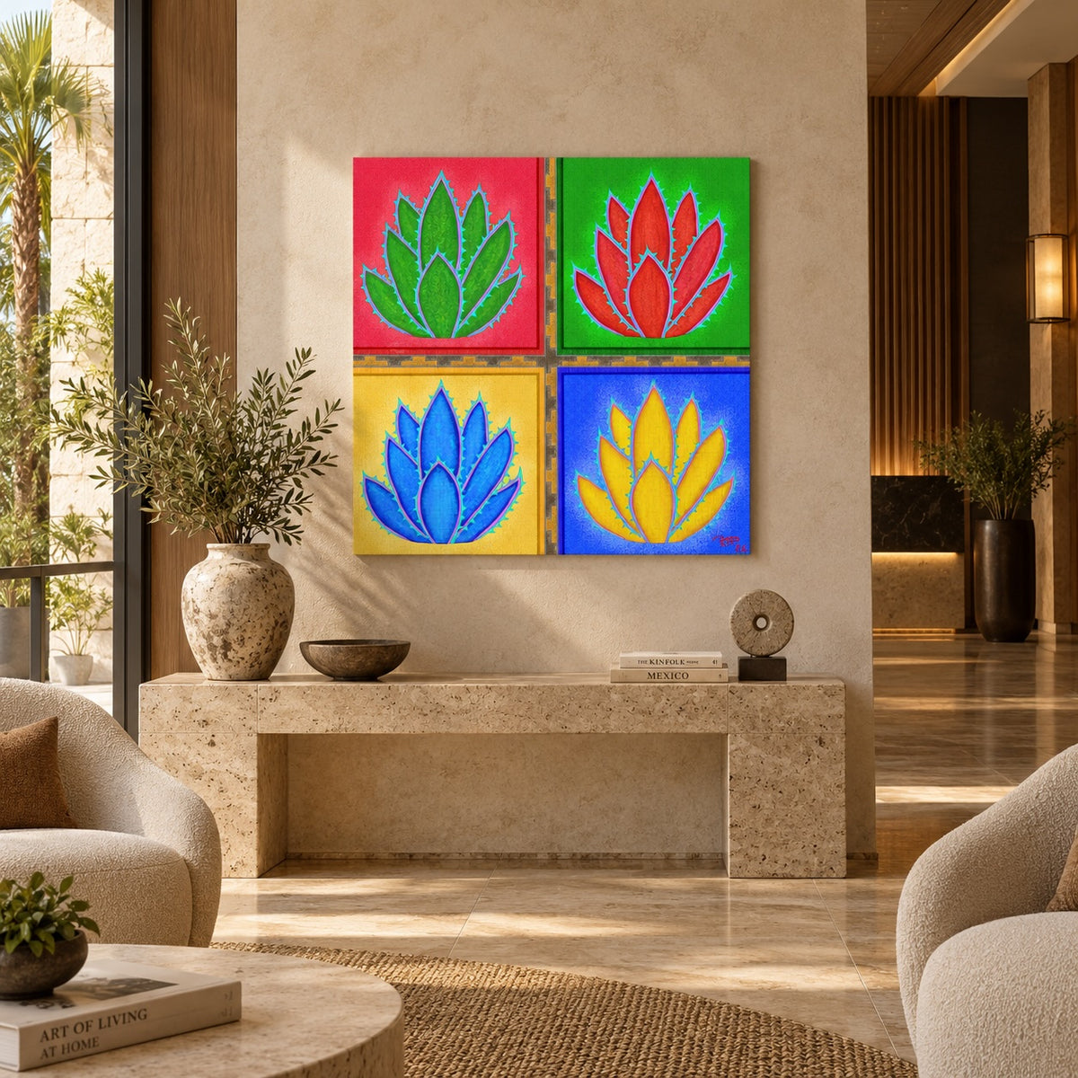 A set of four square wall art panels featuring colorful stylized lotus flowers, displayed in a modern living room setting above a stone console table.